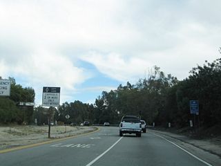 Ramp metering, which limits the flow of traffic onto eastbound SR 134, is in use along the eastbound Colorado Freeway during commuting hours. The left lane is striped for use by carpools during hours of ramp metering.
