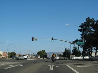 Northbound California 135 (Broadway) meets U.S. 101 Business (Santa Maria Way) at this traffic signal. U.S. 101 Business and California 135 travel north from this point along Broadway toward downtown Santa Maria.