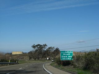 The first exit on California 135 (Orcutt Expressway) is Exit 17, Clark Avenue (one mile). The interchange serves the unincorporated community of Orcutt, which is located south of the city of Santa Maria. The Orcutt Expressway passes through the community; while Exit 17 is a full freeway interchange, California 135 downgrades to an expressway configuration for the connection to future Union Valley Parkway and Foster Road.