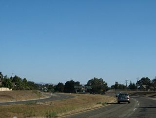 This view shows the California 135 freeway as it approaches Exit 17 (Clark Avenue to downtown Orcutt).