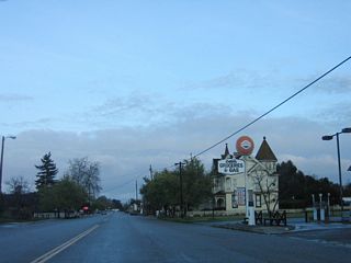 California 135 runs across across Los Alamos along Bell Street.