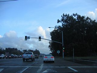 Southbound California 135 (Orcutt Expressway) meets Foster Road at this signalized intersection. After this intersection, the California 135 freeway begins for the rest of the way through Orcutt.