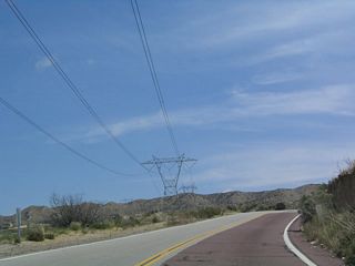 View of power lines as California 138 continues east.