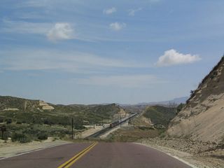 Eastbound California 138 view after cresting Cajon Pass. This view encompasses the railroad, which snakes its way up Cajon Pass to this point, then flattens out en route to Barstow.