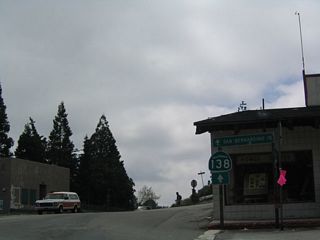 Now in downtown Crestline, California 138 reaches an unusual three-way stop where eastbound traffic does not stop but the other directions must stop. Ahead, California 138 prepares for its end at California 18, which winds it way down the mountain to the city of San Bernardino.