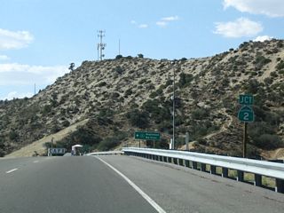 Nearing the top of the grade, westbound California 138 approaches California 2 west to Wrightwood.