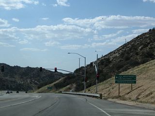 Westbound California 138 meets California 2 west at this traffic signal in Mountain Top. Turn left at the traffic signal to follow California 2 to the Angeles Crest Highway. Continue ahead on California 138 northwest toward Phelan and the Antelope Valley (Palmdale and Lancaster).