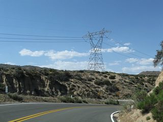 Several Southern California Edison 500kV power lines converge on Cajon Pass and cross over California 138 in this area; they lead toward the Lugo substation northeast of here. Additionally, several railroad tracks use the Cajon Pass to ascend from San Bernardino to the High Desert.