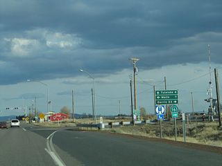 Southbound California 139 meets California 161 at this intersection. Turn right to follow California 161/State Line Road west to the Lower Klamath National Wildlife Refuge and U.S. 97 near Dorris. Turn left here to follow State Line Road, a county-maintained highway, east to Malin, Oregon. California 139, meanwhile, continues southeast toward Tulelake and Newell in Siskiyou County.