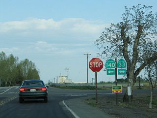 Turn left here to follow California 33 north and California 140 east to Gustine; turn right to follow California 33 south to Santa Nella and Interstate 5 near the O'Neill Forebay.