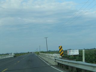 Passing through the Kesterson Unit of the San Luis National Wildlife Refuge California 140 crosses several waterways and wetlands, using bridges such as these.