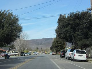 California 146 leaves downtown Soledad and enters a residential area to the northeast. The state route will continue along East Street for a few more blocks, then turn right (southeast) onto Metz Road.