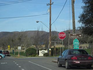 Eastbound California 146/East Street meets Metz Road at this stop sign. Turn right onto Metz Road for the continuation of California 146 to Pinnacles National Monument and to Monterey County G-15 (Metz Road) south to King City.