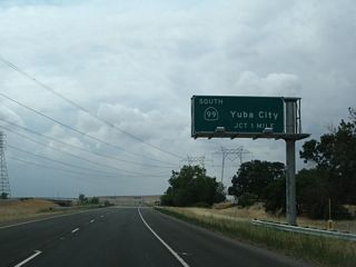 The final interchange along California 149 north is Exits 5A-B, California 99 north to Chico and Red Bluff and south to Gridley and Yuba City (one mile). This sign was added when the state route was widened to expressway standards.