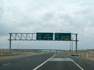 Northbound California 149 reaches Exit 5A, California 99 south to Yuba City. The left two lanes will default onto Exit 5B, California 99 north to Chico and Red Bluff.