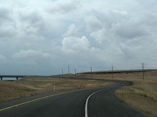 The transition ramp from northbound California 149 to California 99 south to Yuba City (Exit 5A). This sweeping ramp provides a high-speed, seamless connection between the two routes.