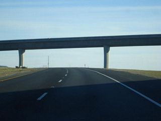 Southbound California 149 passes under the transition ramp from California 149 north to California 99 south.