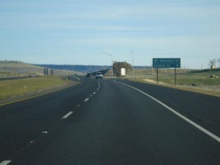 Returning to the expressway configuration, southbound California 149 meets Openshaw Road and Shippee Road at this at-grade intersection.