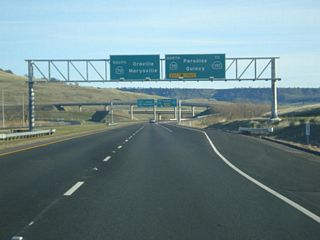 The right lane becomes exit only for Exit 1B, California 70 east to Quincy and California 191 north to Paradise. The left two lanes will default onto California 70 south to Oroville via Exit 1A.