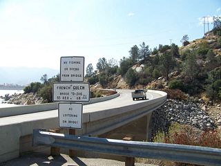 Southbound California 155 crosses the French Gulch Bridge over an arm of Isabella Lake at postmile 68.71. Photo taken by Erik Fox (10/15/06).