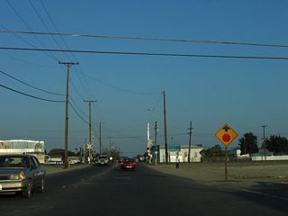 Garces Highway crosses the Union Pacific Railroad ahead of SR 99 Business (High Street / old U.S. 99) south to Bakersfield.