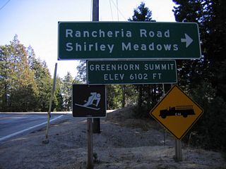 The highest point along SR 155 is at Greenhorn Summit (el. 6,102 feet), where Garces Highway meets Rancheria Road south to Shirley Meadows. .