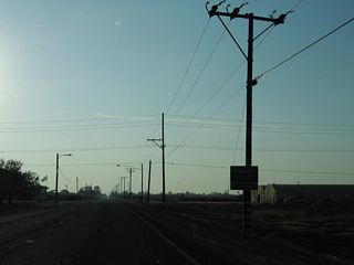 SR 155 (Garces Highway) enters the city of Delano west at Browning Road. The intersection with Browning Road was replaced with a roundabout by 2021.