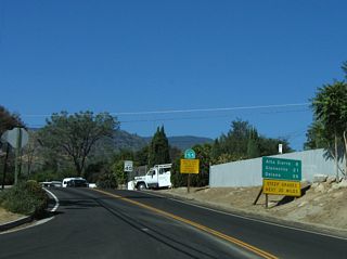 Rising 3,500 feet in elevation west from Wofford Heights, SR 155 (Evans Road) follows a curvaceous corse toward the Central Valley via Alta Sierra and Glennville.