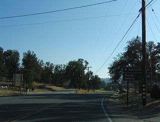Granite Road separates from SR 155 south beyond Linns Valley. The former alignment of the state route travels southwest to Bakersfield, while the current alignment continues west to Woody and Delano.
