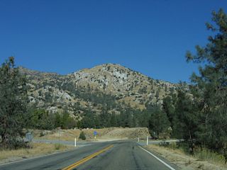 SR 155 runs between Hungry Gulch Campground and Boulder Gulch Campground north of postmile 67.30.