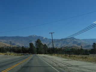 California 155 enters the census designated place of Wofford Heights.