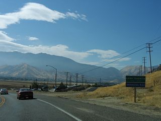 California 155 (Kernville Road) enters the unincorporated community of Lake Isabella.