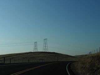 A pair of 220kV Southern California Edison power lines cross over California 155.