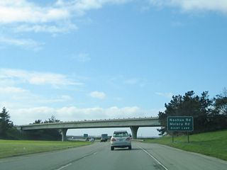 The next exit is Exit 414, Nashua Road and Molera Road. In the distance ahead (under the bridge) is the end California 156 shield (not photographed).