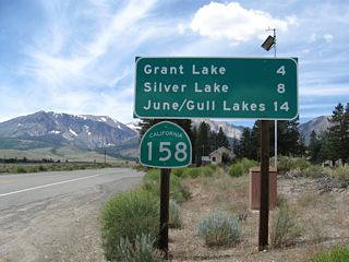 The first reassurance shield for SR 158 south is posted four miles from Grant Lake and eight miles from Silver Lake. The June Lake Loop is a popular spot for fishing, camping, hiking, and other outdoor recreational opportunities. Each lake offers varying recreation, include fishing, swimming, boating, picnicking, camping, and hiking.