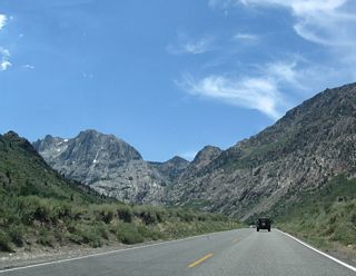 Upon leaving Rush Creek Canyon, California 158 enters a broad valley that contains Silver Lake. Cascades (Alger Creek) carry water from the high country down toward Silver Lake, which spreads east of the highway.