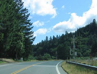California 162 is a split route, with one segment connecting U.S. 101 with Covelo and Round Valley. The other section is located in the Central Valley, providing an east-west route between Elk Creek and Oroville via Willows and Butte City. Unconstructed is the section over Mendocino Pass, which would connect Covelo with Elk Creek via forest service roads. We begin our profile on the western section of California 162, as eastbound California 162 crosses the railroad tracks immediately after the U.S. 101 intersection in Mendocino County.