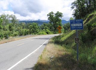 After the end shield, California 162 becomes Forest Service Highway 7 and is shielded with this tiny brown sign. From here, the forest service route crosses over Mendocino Pass, but much of the route is substandard and unpaved.