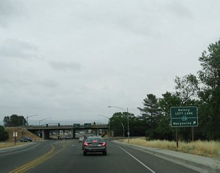 After crossing the Feather River, eastbound California 162 approaches the interchange with California 70. Use California 70 south to Marysville and Sacramento or north to Chico (via California 149) and Oroville.