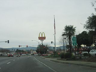 After the California 70 interchange, California 162 briefly overlaps with California 70 Business. The two routes follow Oroville Dam Boulevard between California 70 and Myers Street, where California 70 Business turns north onto Myers Street. The business route passes through downtown Oroville, then returns to California 70 via Nelson Avenue.