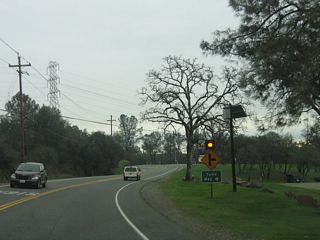 Eastbound California 162 approaches the turnoff to Tyme Way.