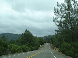 California 162 continues along the southern edge of Lake Oroville, then curves due north toward the Middle Fork of the Feather River. At the span over this leg of Lake Oroville, California 162 will use a suspension bridge to make the crossing.