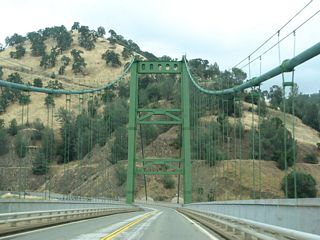 The original Bidwell Bar Bridge was moved prior to the area being flooded and is now used as part of a walking path at the south side of the lake near a parking lot located at the north end of Bidwell Canyon Road near a marina. Along this "new" suspension bridge, "eastbound" California 162 is actually traveling north.