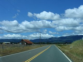 Entering Round Valley, California 162 assumes a rural/agricultural feel. Round Valley is surrounded on all sides by mountains and ridges: Poonkinny Ridge to the south, Bluenose Ridge to the northeast, Dingman Ridge to the southeast, and Round Mountain to the south.