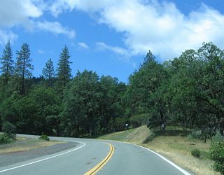 Traveling over the Poonkinny Ridge, California 162 has lots of switchbacks and curves. Traffic can be busy, since this is the only road connecting Covelo to the rest of the state during most months (except summer).
