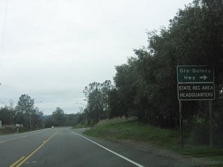 Oroville-Quincy Highway splits away from California 162 at this intersection. California 162 veers left along Olive Highway.