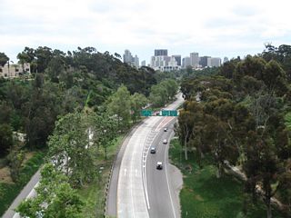 Ramps connecting SR 163 with I-5 north to San Diego International Airport (SAN) and south to Park Boulevard and Chula Vista separate below the Cabrillo Bridge.