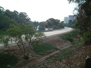 If the expanded freeway were constructed, this ramp would have continued north, covering an existing foot path within Balboa Park park.