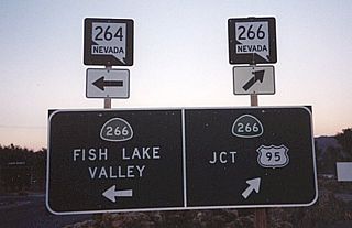 The guide sign on SR 168 east at SR 266 previously included shields for Nevada State Routes 264 and 266. This route has never been signed as "California 264."