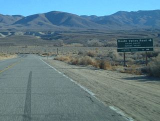 California 168 meets Death Valley Road at this intersection. This turnoff is located just east of Big Pine. Death Valley Road leads south along a paved/gravel road via Saline Valley along the western fringe of the national park.  The road ultimately ends at California 190 near Darwin.